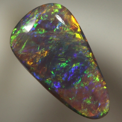 SOLID BLACK OPAL Bright sparkles of red and orange with green and blue